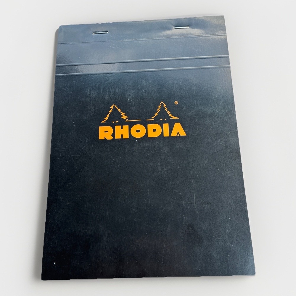 Rhodia (R162009) 6" x 8 1/4" Staplebound Notepad (Graph Grid Paper) Black Cover‎